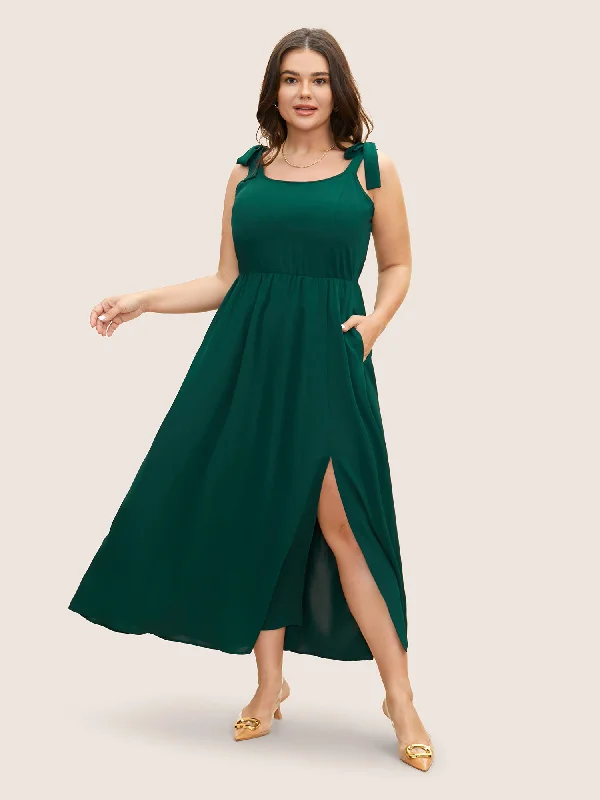 Plus size dresses featuring mesh overlays feel chic -Solid Tie Knot Slit Hem Dress