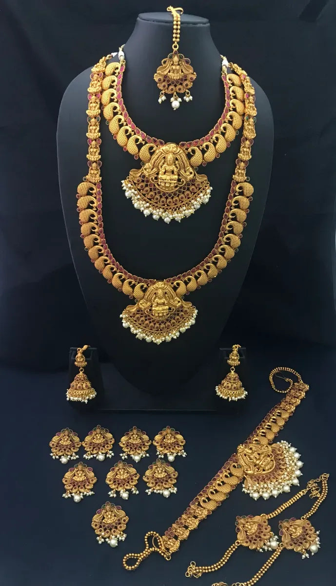 Beautiful necklaces and pendants with layered chains for a fashionable, chic look-Traditional Temple Design Matte Finished Mango Haram With Lakshmi Pendant Bridal Set