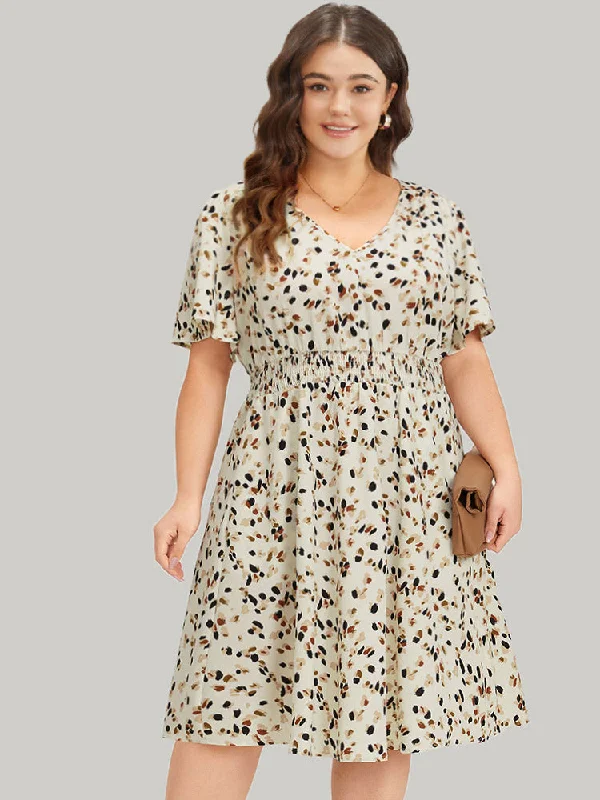 Plus size dresses with stretchy knits hug curves -Allover Print Shirred Pocket V Neck Dress