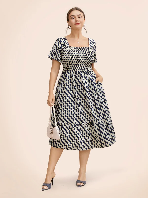 Plus size dresses with playful details add charm -Geometric Print Shirred Ruffle Hem Dress