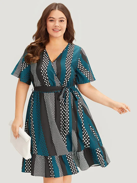 Plus size dresses featuring velvet textures feel plush -Striped & Polka Dot Graphic Pocket Ruffle Wrap Dress