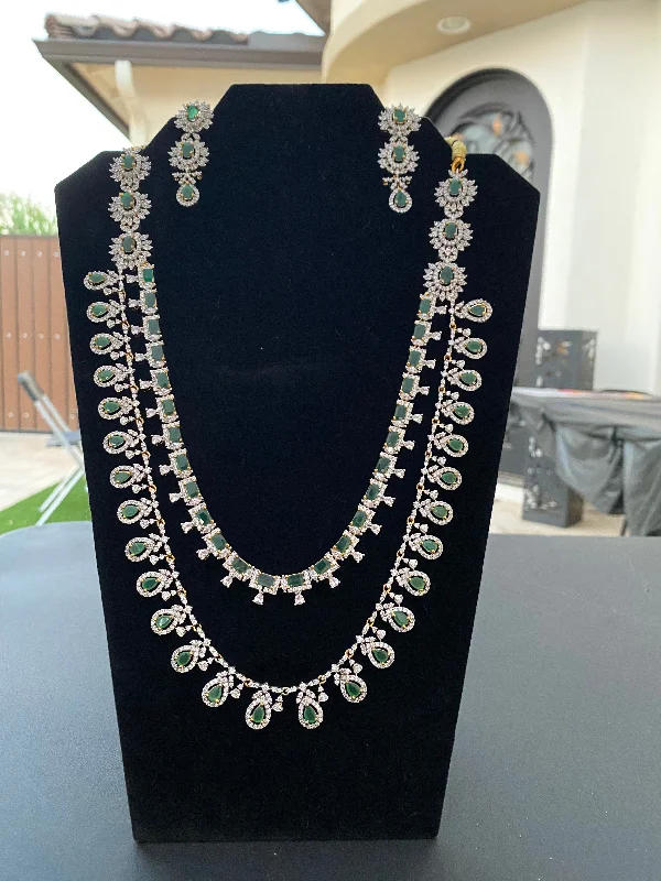 Necklaces and pendants with clear quartz for a pure and radiant look-Elegant Green Stoned Two Layer American Diamonds Necklace With Earrings