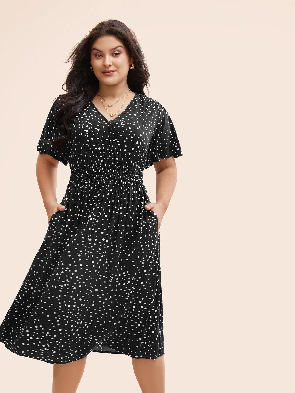 Plus size dresses featuring earthy tones are grounding -Polka Dot Wrap Pocket Shirred Ruffle Sleeve Dress