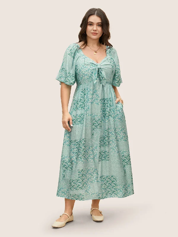 Plus size dresses featuring gemstone details shine subtle -Ditsy Floral Tie Knot Flutter Sleeve Dress