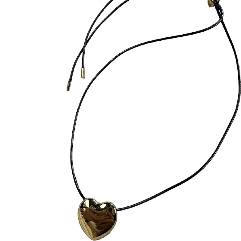 Simple necklaces and pendants with tiny charms for a delicate and casual vibe-Leather Heart Choker