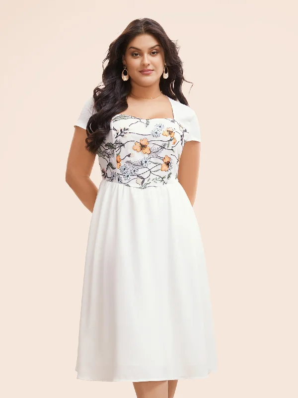 Plus size dresses featuring beaded hems are ornate -Floral Embroidered Heart Neckline Midi Dress