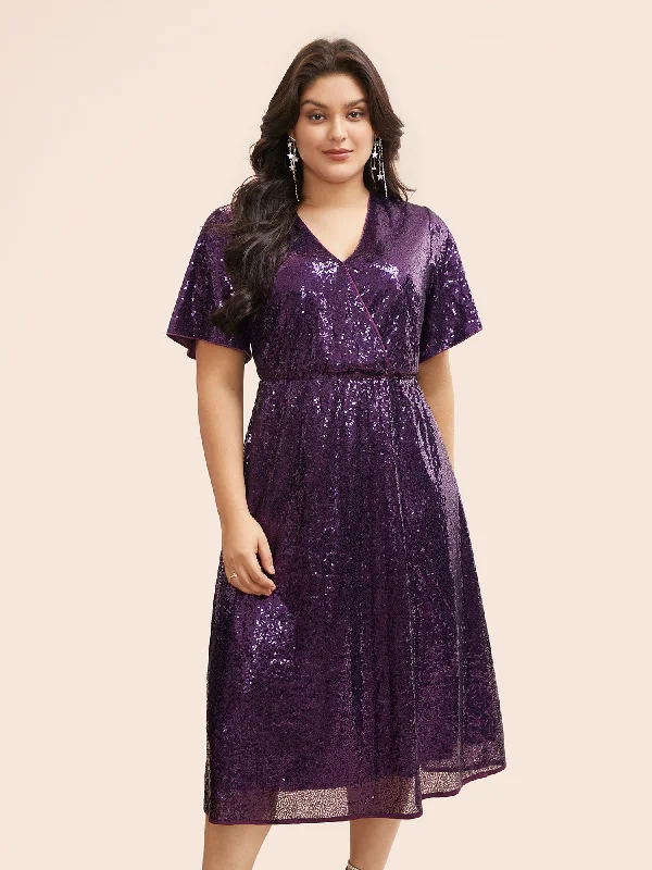 Plus size dresses for bold outfits match well -Sequin Overlap Collar Ruffle Sleeve Dress