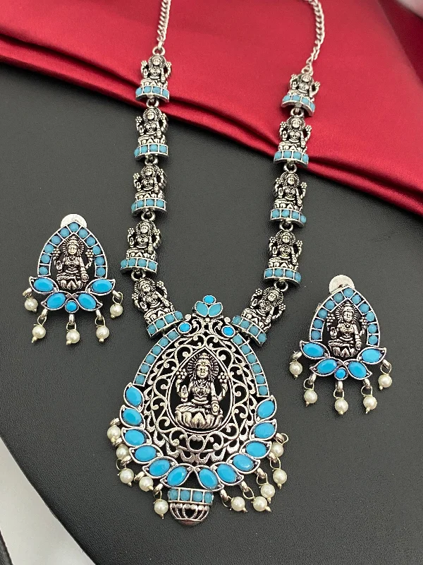 Necklaces and pendants with angel wing motifs for a spiritual, meaningful design-Sizzling Blue Stone Studded Lakshmi Pendant Temple Jewelry Necklace Set With Earrings