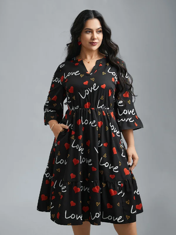 Plus size dresses with soft textures feel cozy -Notched Collar Heart Print Tiered Midi Dress