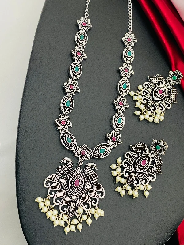 Necklaces and pendants with lotus flower designs for a spiritual, peaceful vibe-Dazzling Multi Color Stone Studded Peacock Floral Designed Silver Toned Oxidized Necklace With Earrings