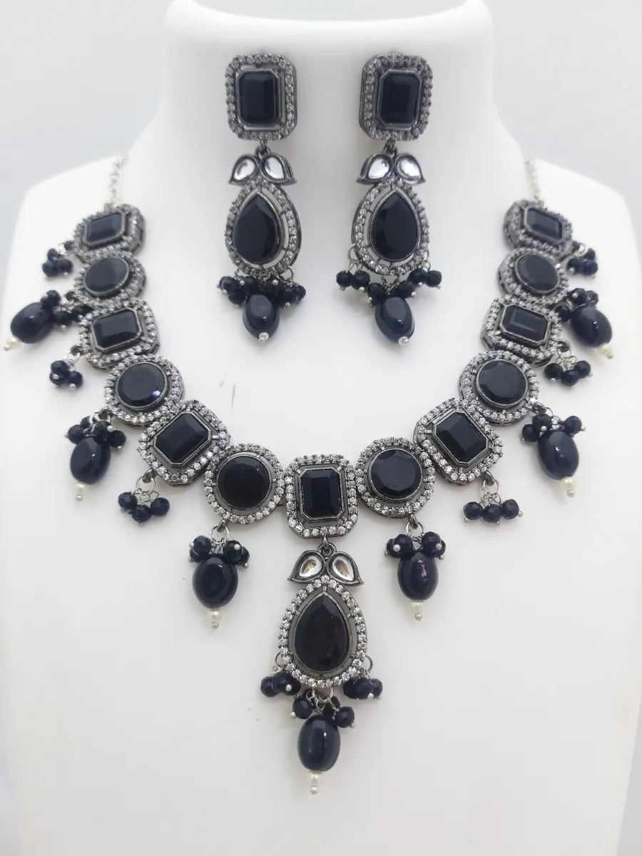 Necklaces and pendants with matching rings for a coordinated set of jewelry-Mesmerizing Zircon Stone Ornamented Traditional Silver And Black Color Alloy Necklace Set